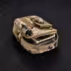 a camouflage bag with a small object